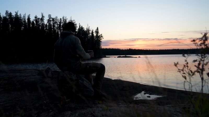 Sitting Near Lake on Camping